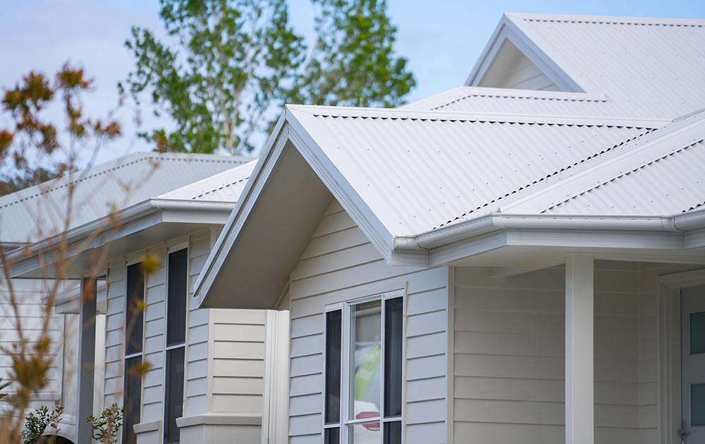 COLORBOND steel cool roofing.Close-up of a modern house featuring a clean, white steel roof.