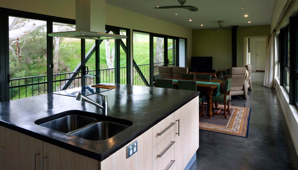 Bridge House has roofing, cladding flashing, cappings and gutters made from COLORBOND® steel in the colour Windspray® and flooring made from LYSAGHT BONDEK® profile under concrete slab.