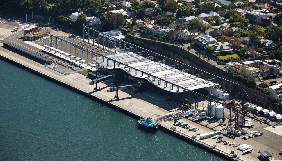White Bay Cruise Terminal uses Fielders ARAMAX® profile aluminium roof; BlueScope steel plate used throughout, including to fabricate the long-span, curved roof purlins; LYSAGHT® purlins and girts