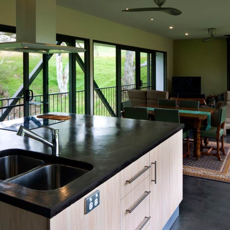 Bridge House has roofing, cladding flashing, cappings and gutters made from COLORBOND® steel in the colour Windspray® and flooring made from LYSAGHT BONDEK® profile under concrete slab.