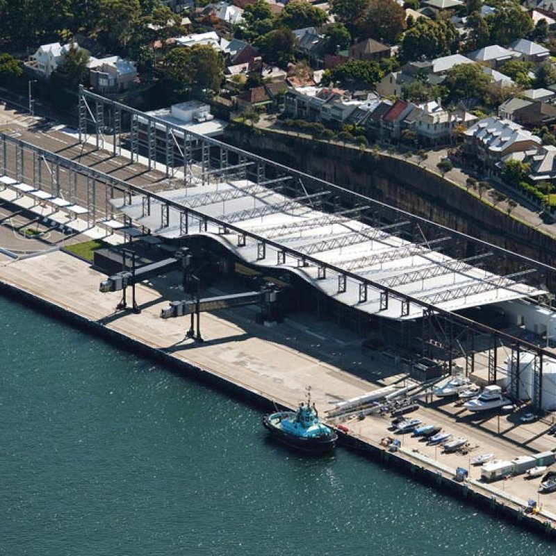 White Bay Cruise Terminal uses Fielders ARAMAX® profile aluminium roof; BlueScope steel plate used throughout, including to fabricate the long-span, curved roof purlins; LYSAGHT® purlins and girts